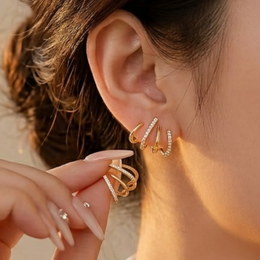 Mabyla | Glow Ohrringe – Goldene Multi-Line Ear Cuffs mit Zirkonia